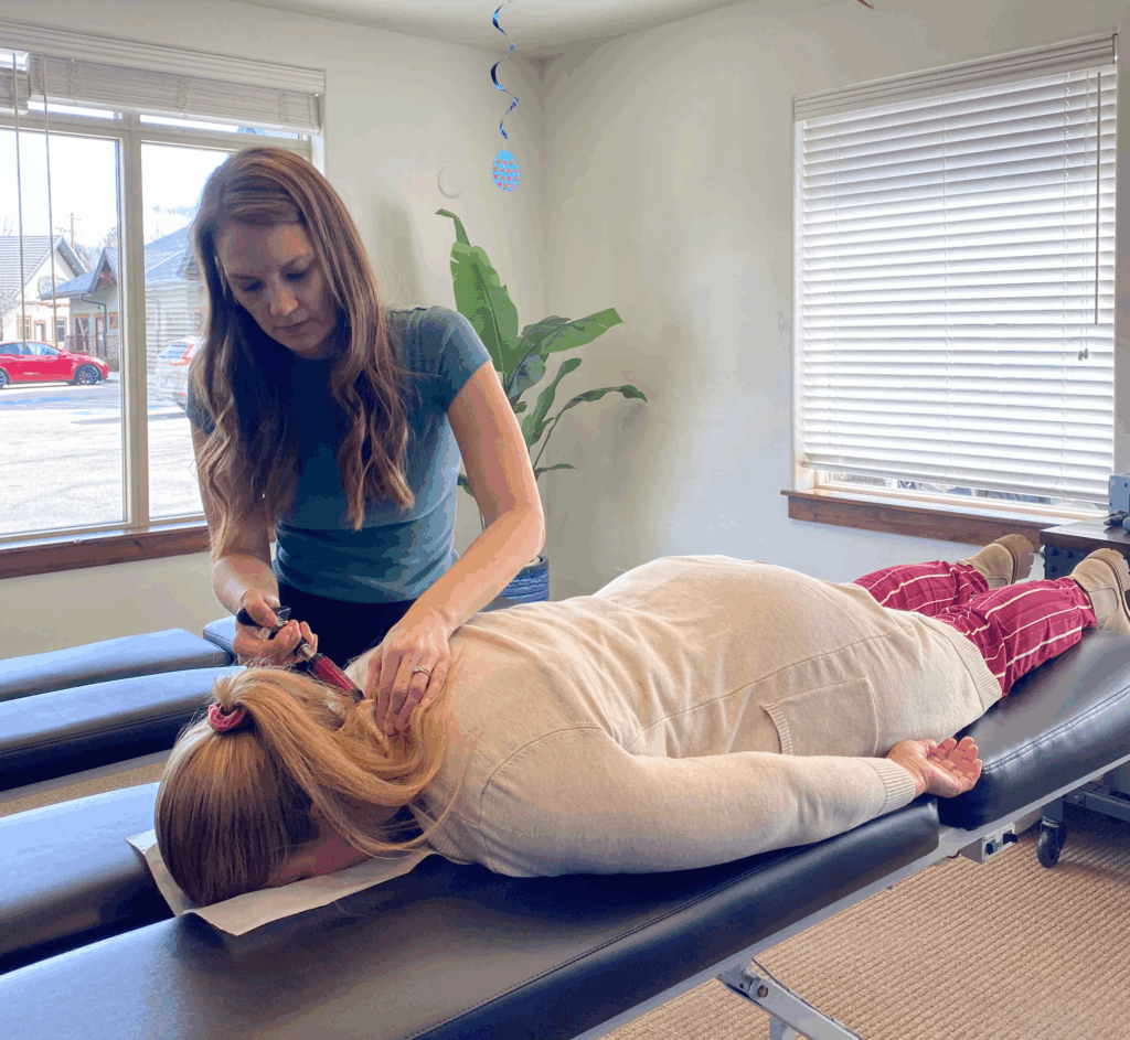 Dr. Kristin Moore attend patient rotator cuff treatment