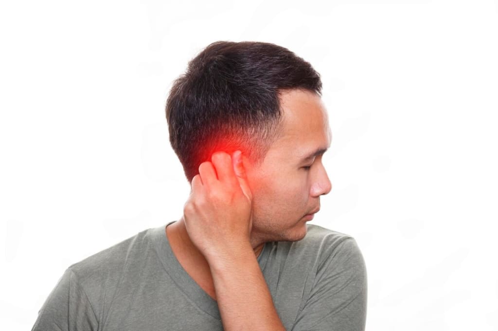 man suffering vertigo